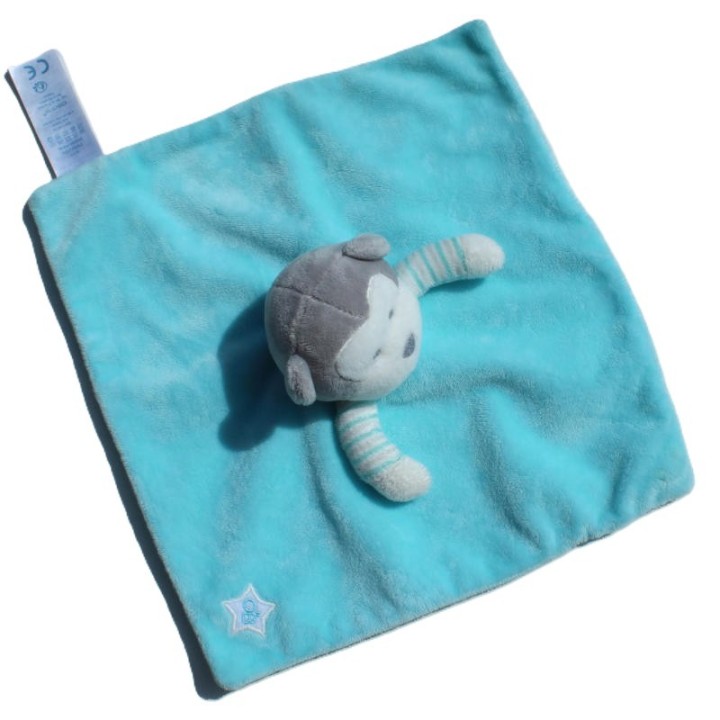 doudou plat singe turquoise Obaidi, vue de dessus