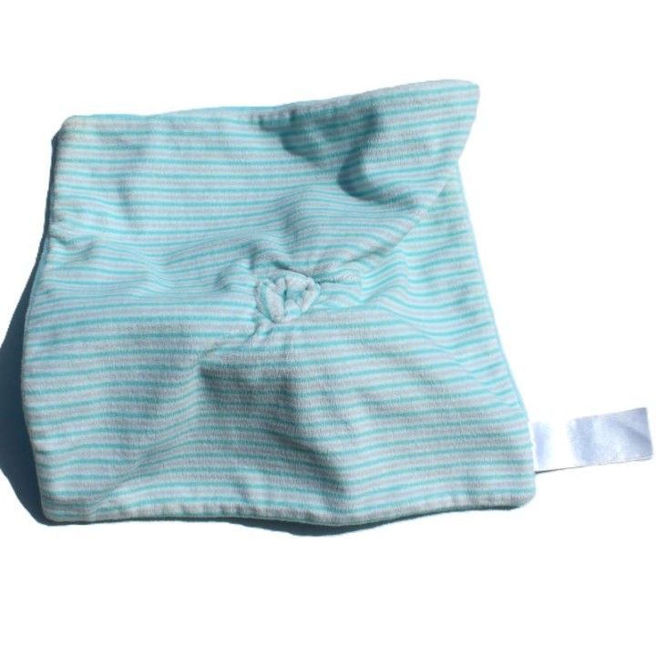photo dos doudou Obaidi singe turquoise, rayures